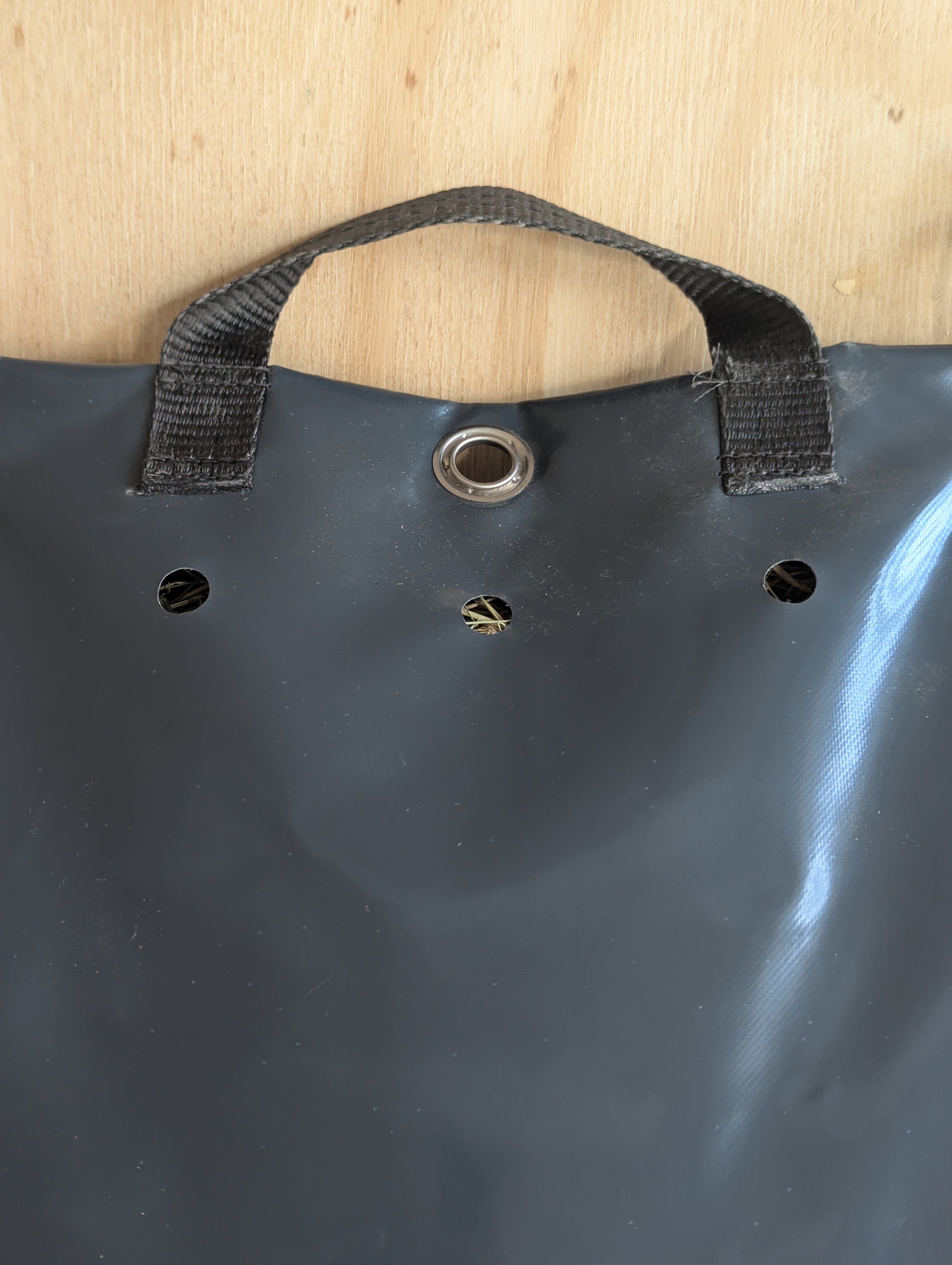 Close-up of HayDrop ventilation holes and carry handle